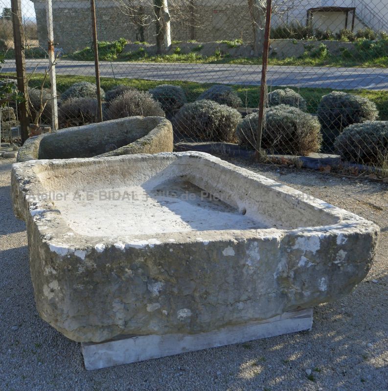 Old stone trough for exterior decoration by The Antique Materials in Provence Alain BIDAL