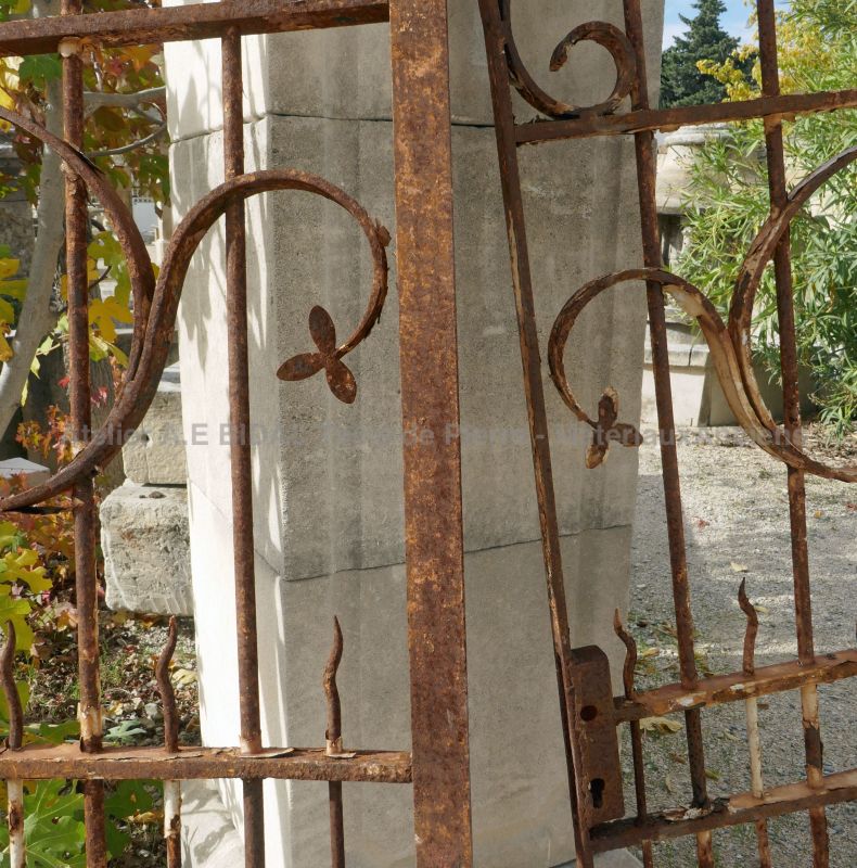 Detailed picture of the lock on our old open-worked wrought iron gate.