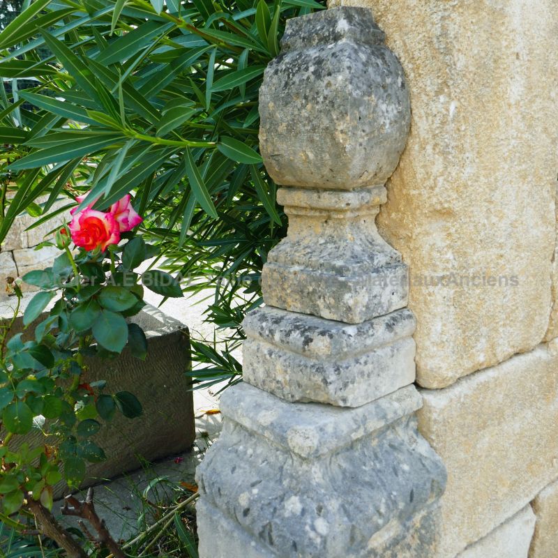 Detail of one of the sculpted side stone on our large garden fountain in stone and metal - Alain Bidal Antique Materials in Provence