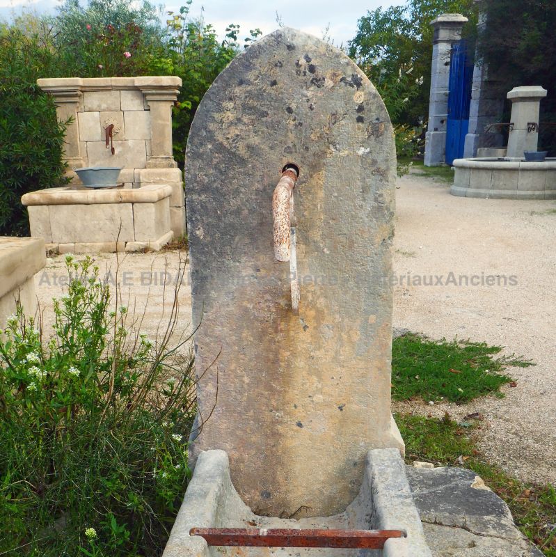 Old stone garden fountain : a unique wall fountain for sale in Provence at Atelier Alain BIDAL