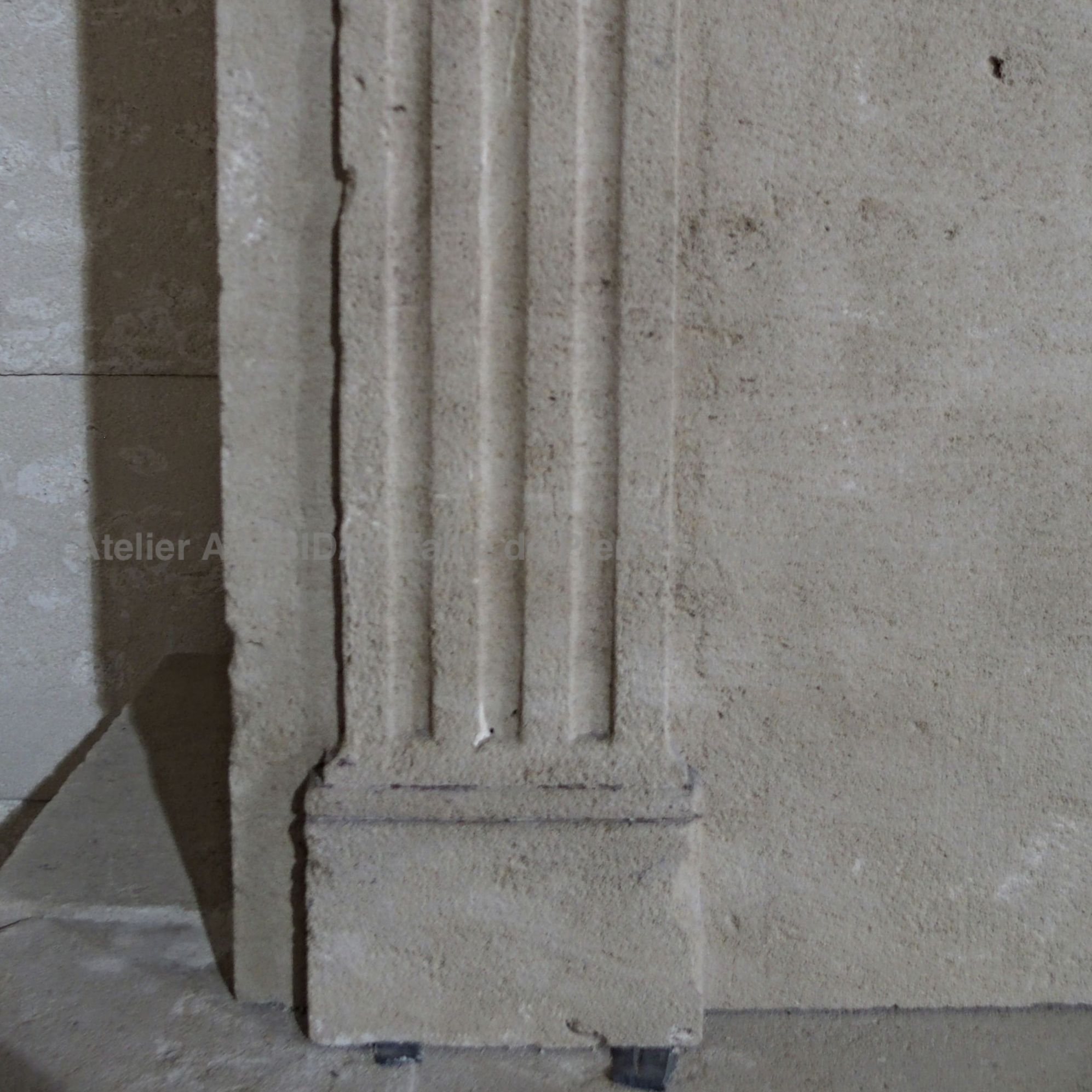 Jamb  of our Louis 16 fireplace made of Savonnière stone.