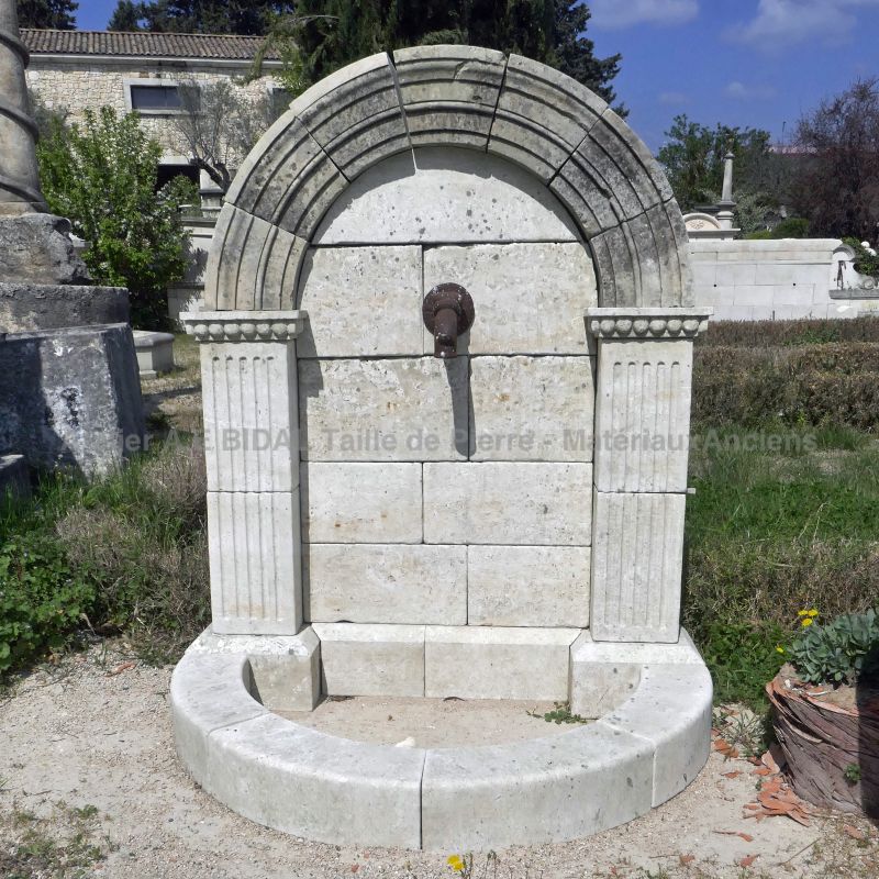 Original weathered natural stone fountain by the stonemason in Provence Alain BIDAL