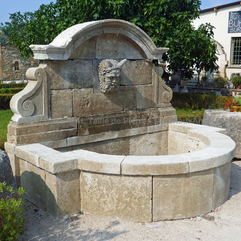 Old stone large fountain by the artisan stonemason in Provence Alain BIDAL