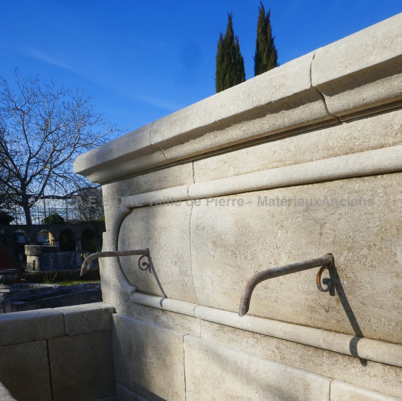Detail of the 3 antique wrought iron water spouts on the pediment of our large fountain crafted in stone
