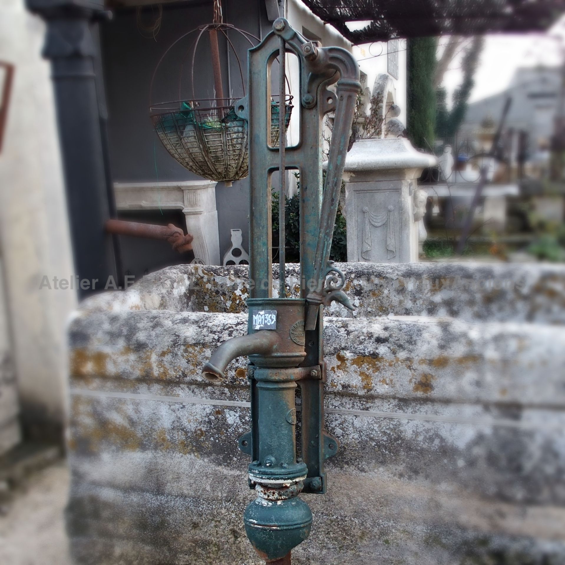 Beautiful hand pump for garden - a water pump with a lot of style.