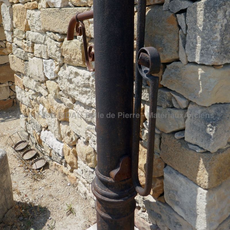 Manual water pump : an antique water pump in cast iron by Antique Materials in Provence Alain BIDAL