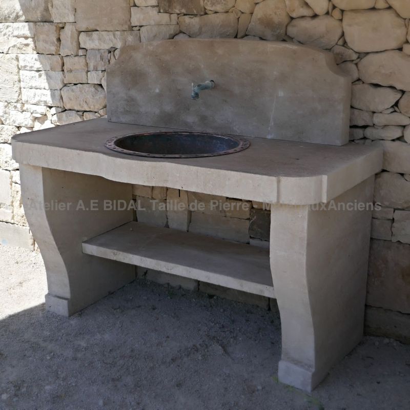 For your outdoors decoration : stone sink with copper tray from Atelier Bidal.