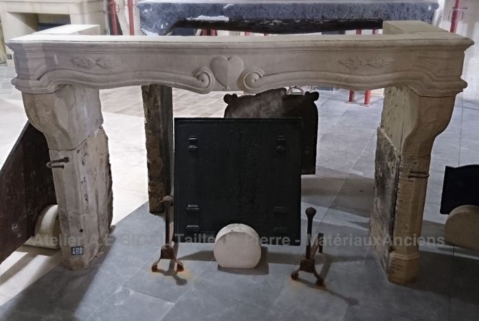 Antique fireplace in white stone finely carved - decorative fireplace.