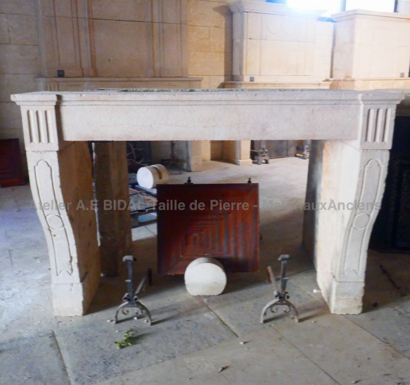 Louis 16 fireplace - antique stone fireplace by Atelier Alain BIDAL (Provence)