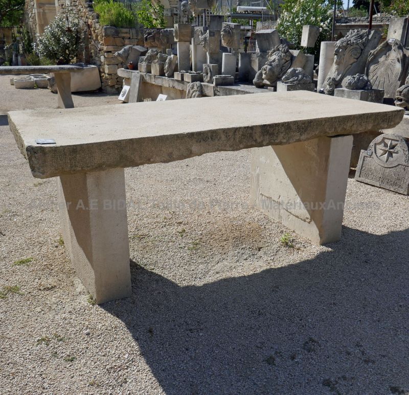Our old garden furniture: beautiful old table made of massive stone.