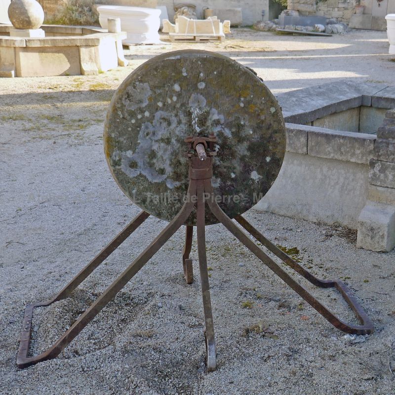 Large old whetstone on a solid wrought iron base by The Antique Materials in Provence Alain BIDAL