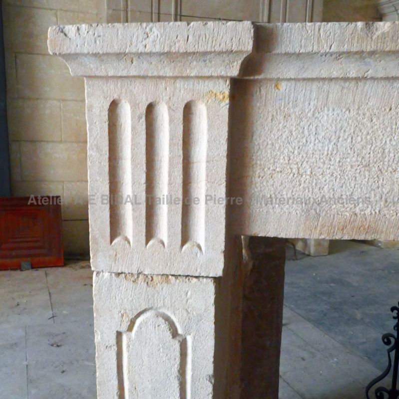 Reclaimed carved limestone fireplace : a louis XVI mantel for sale at Alain BIDAL, Antique Materials in Provence