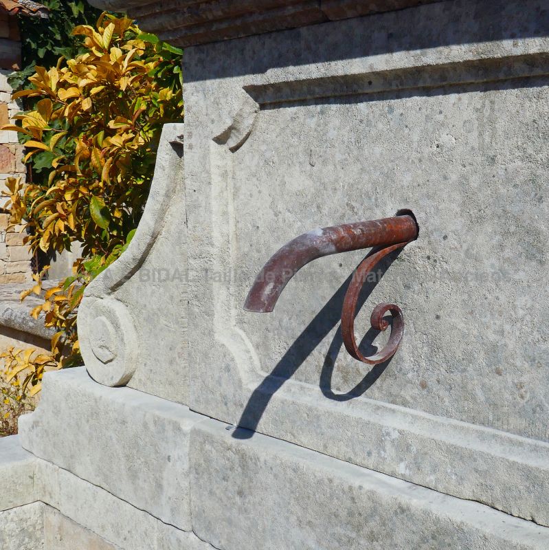 Picture of the pediment of our large wall fountain in old patinated stones