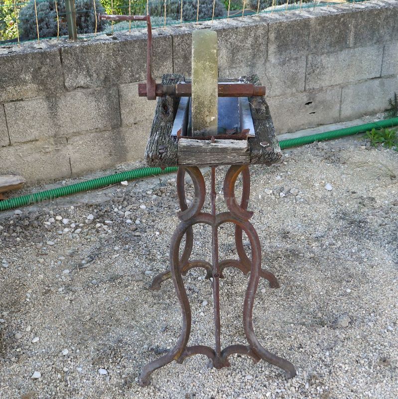 Former sharpening stone on sale in Provence at Alain Bidal's Antique Materials