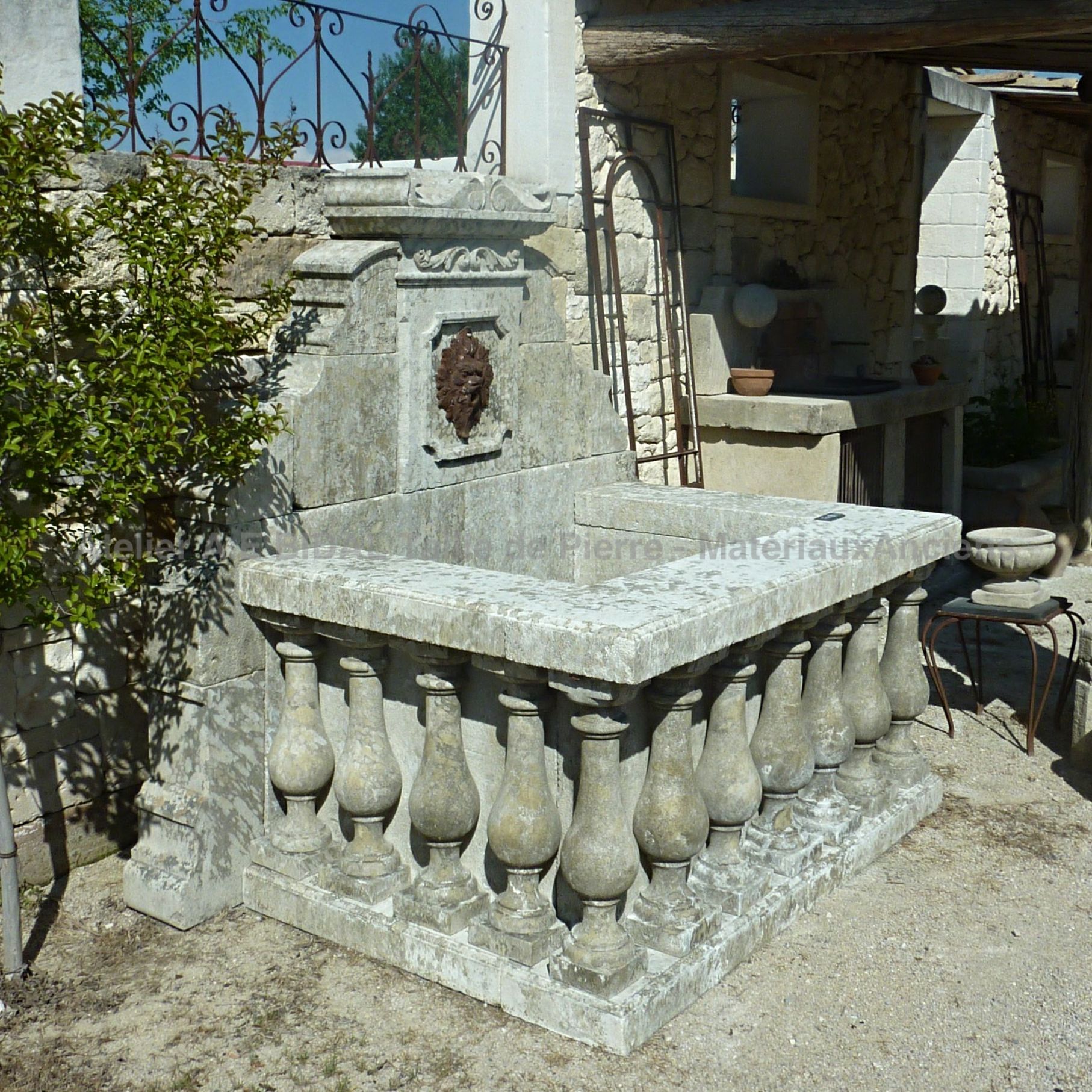 Large garden fountain in old stone | Wide selection of natural stone fountains in Provence at Alain Bidal.