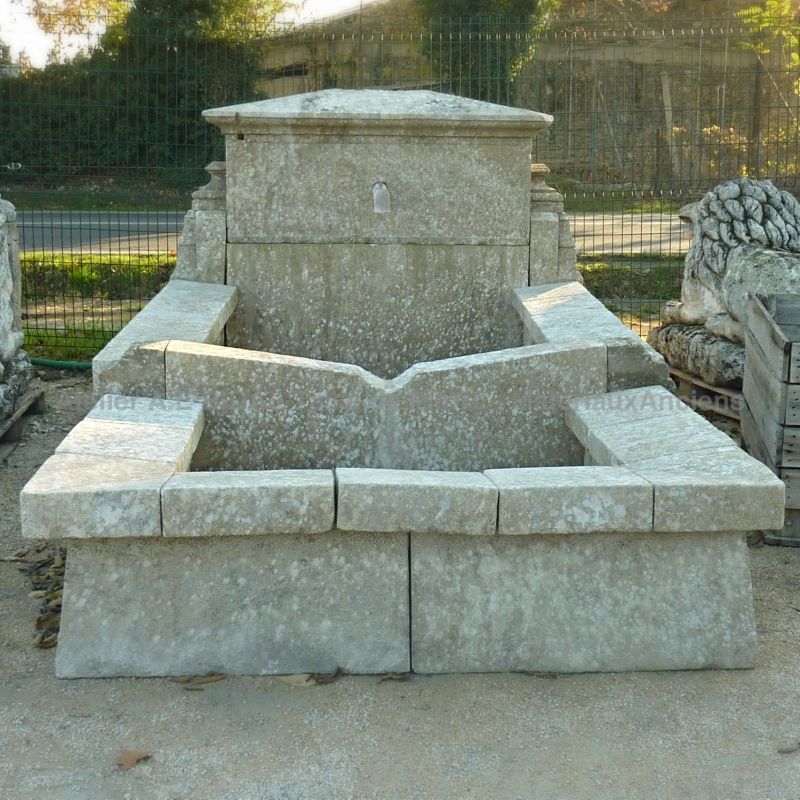 Provencal village style rustic stone wash house inspired by an old washhouse