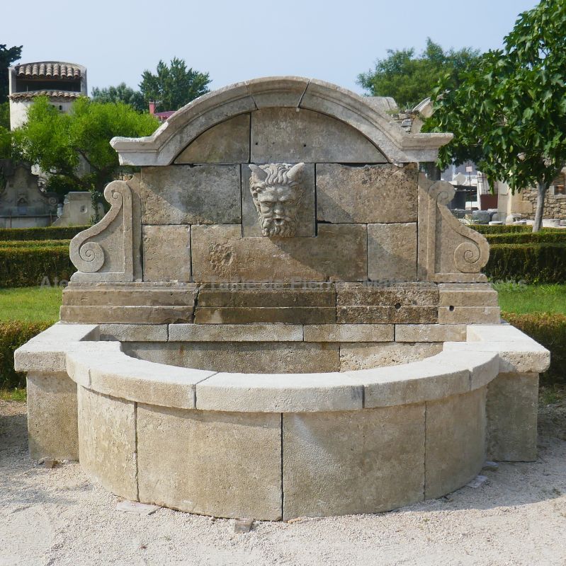 Old garden fountain in patinated stones by Alain BIDAL Antique Materials in Provence