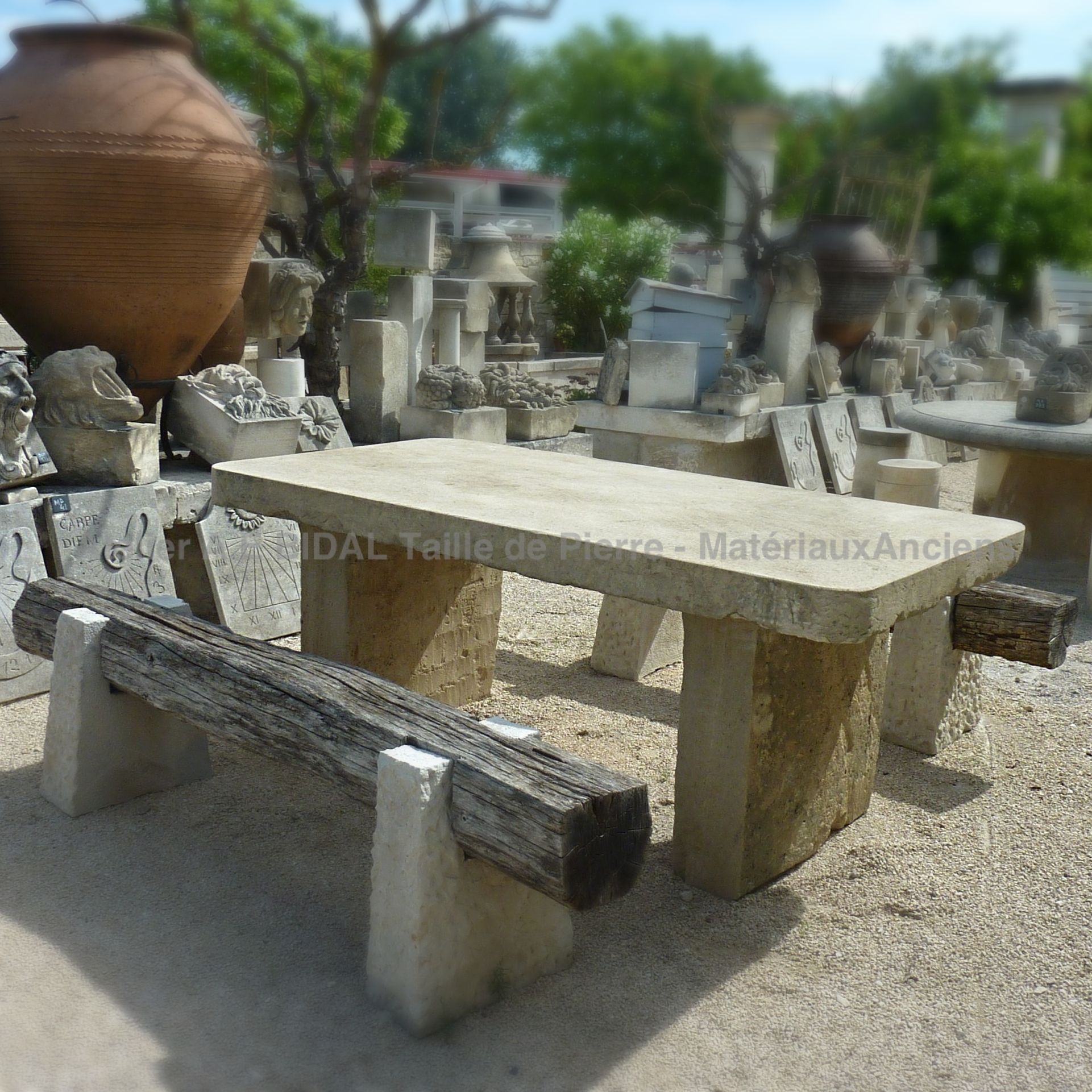 Our antique garden furniture : beautiful ancient table made of massive stone.