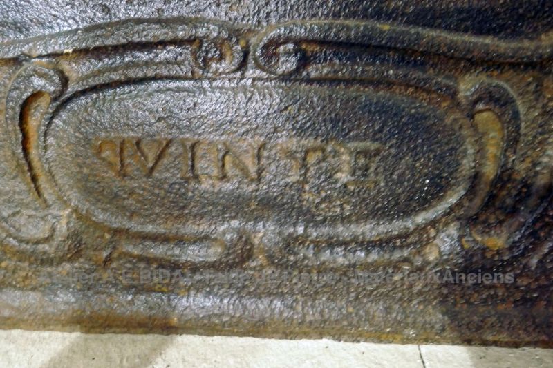 Antique cast iron fire back: Lot fleeing Sodom in flames