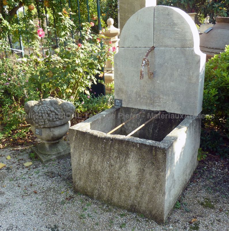 Beautiful garden wall fountain | Outdoor fountain with stone trough | Cheap fountain in stone for garden's layout.