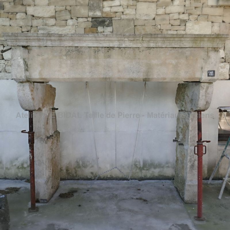 Louis XIII fireplace in stone - An authentic Louis 13 countryside fireplace.