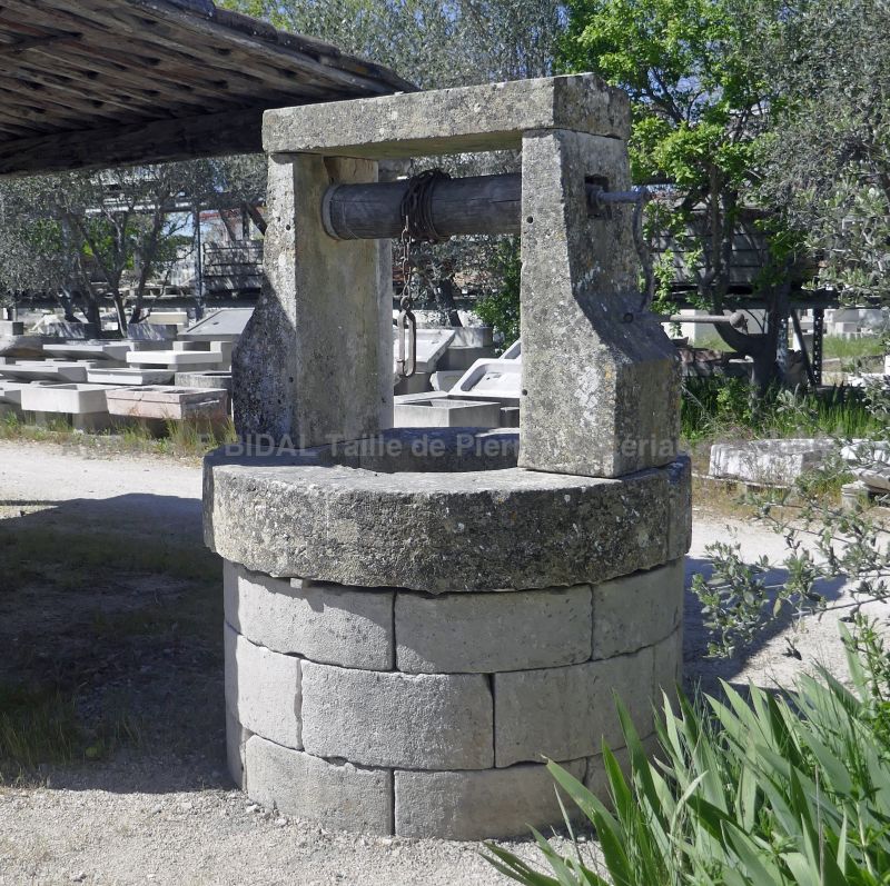 Country-style well in old weathered stones : a beautiful round well for sale at the Atelier Alain BIDAL, Provence