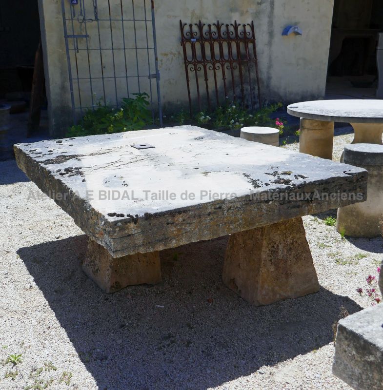 Garden coffee table in natural weathered stones for sale exclusively in Provence at the Atelier Alain BIDAL