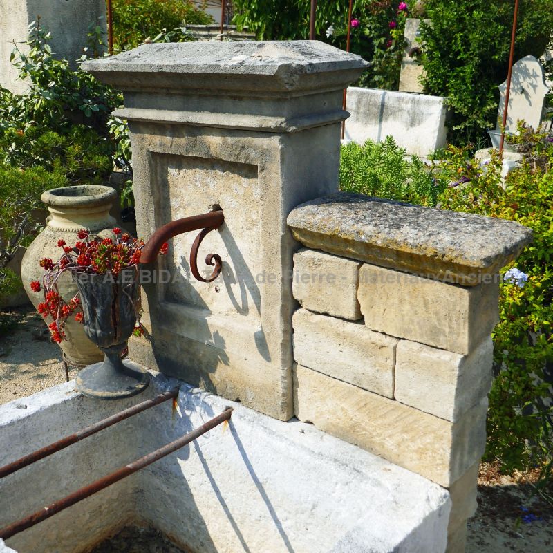Detail of the stone pediment on our garden fountain with old trough | Decorative fountain for sale in Provence at Bidal's.