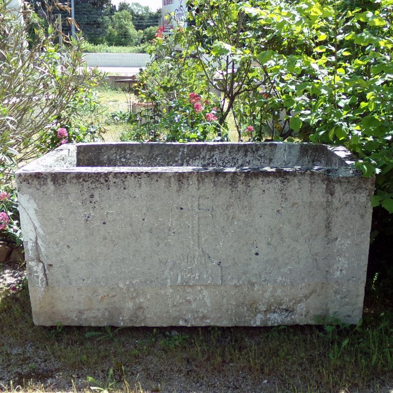 Large solid trough made of natural white stone with beautiful natural patina