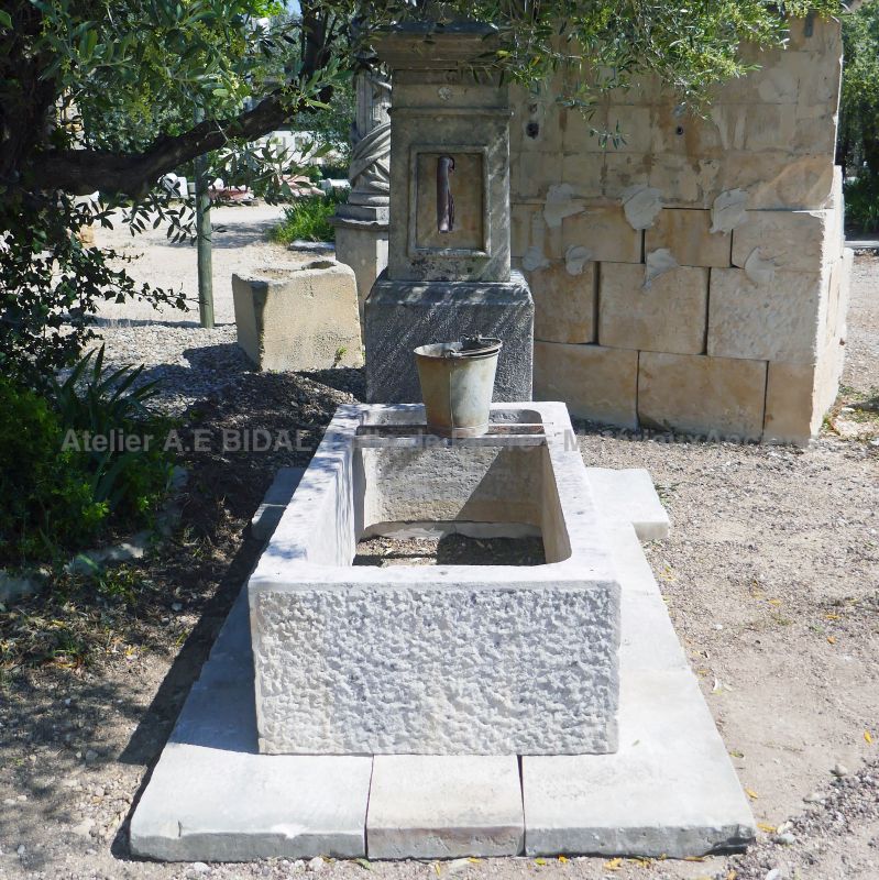 Garden fountain in old stones for sale at The Antique Materials in Provence Alain BIDAL