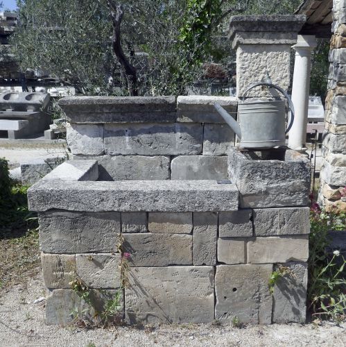 Beautiful stone and wrought iron wall fountain | Antique fountain of Provence full of charm for the decoration of the garden