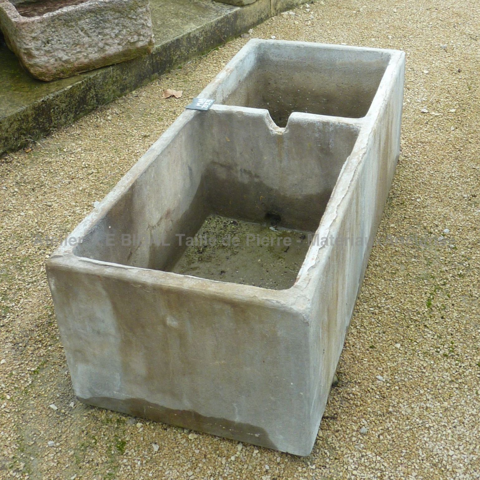 Double rectangular basin - old concrete wash house.