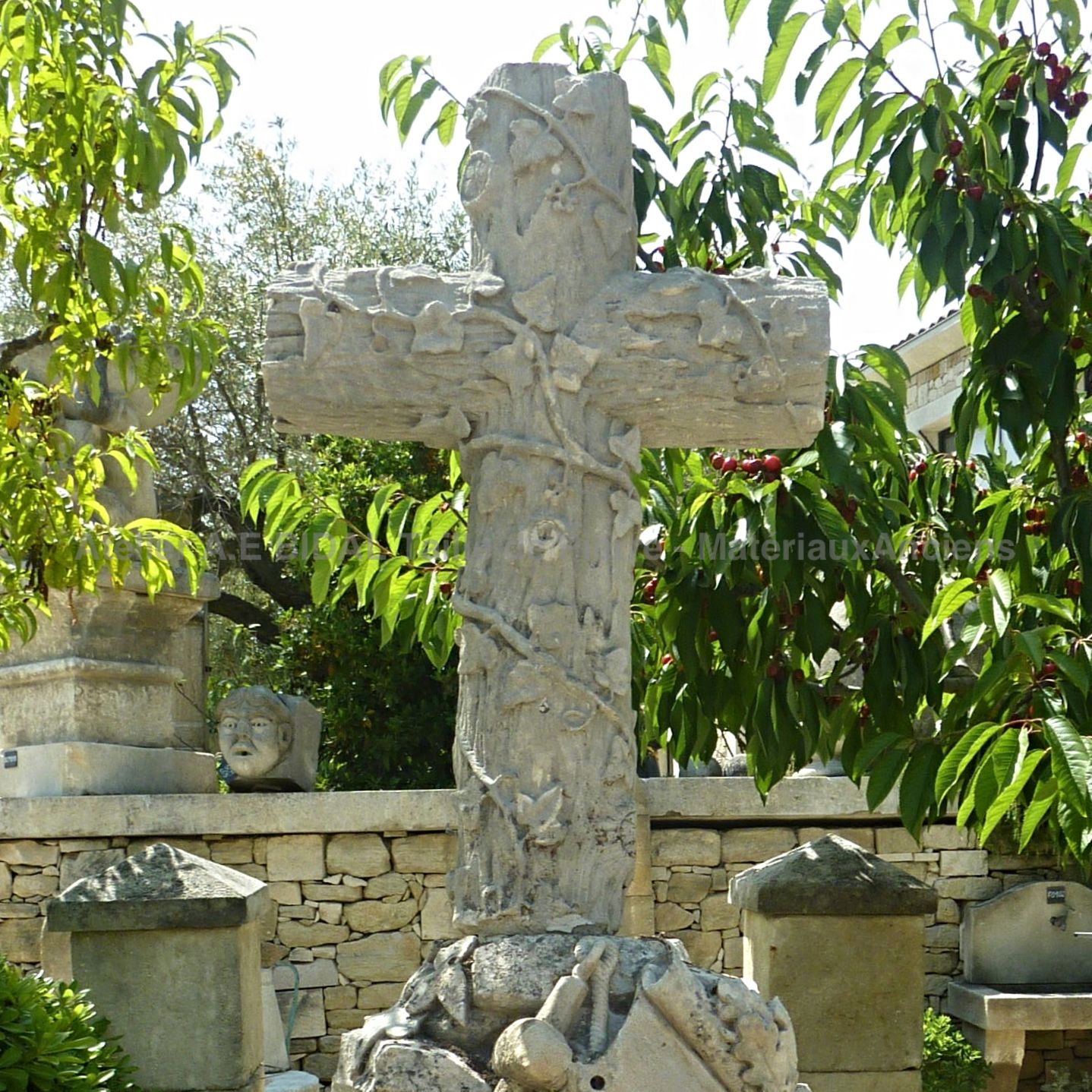 Beautiful antique stone cross for an outdoor decoration in a French religious heritage style.