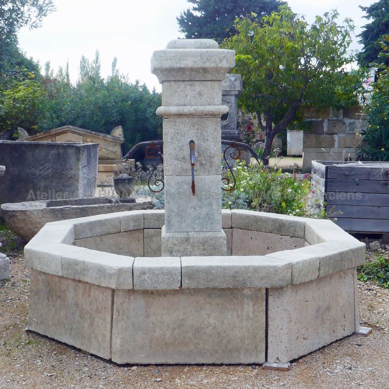 Large octagonal central fountain in old stones by the stonemason Alain BIDAL, Provence