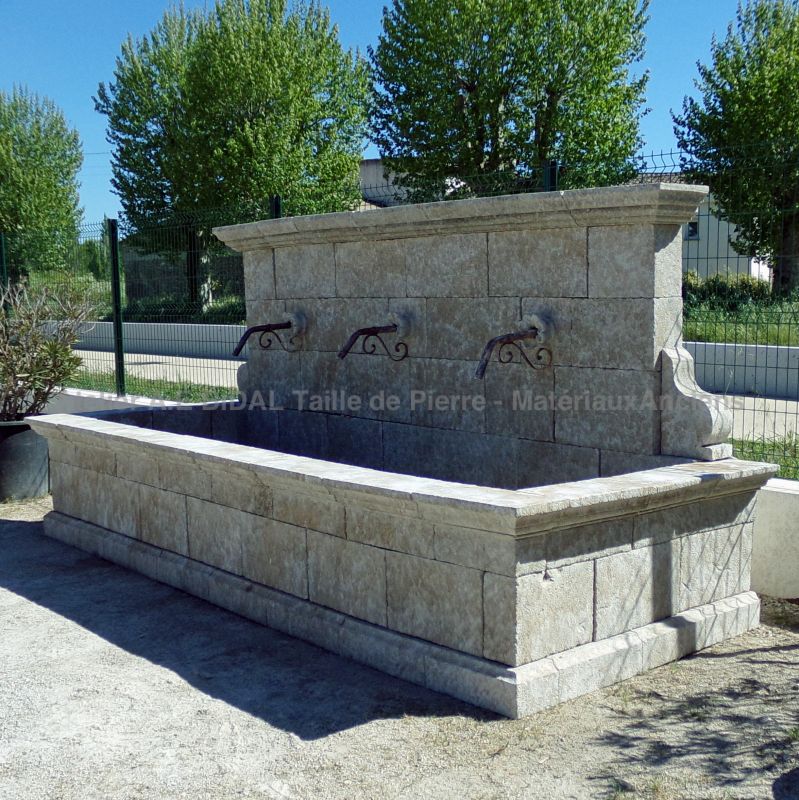 Weathered stone garden fountain - Large wall fountain for sale at Atelier Alain BIDAL (Provence)