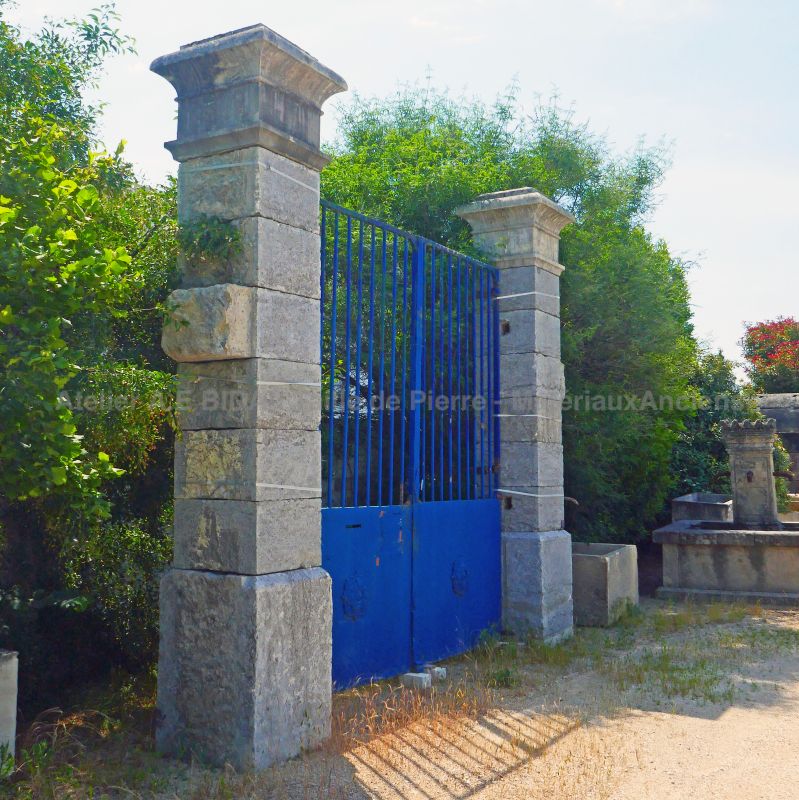 Large and tall rustic pillars in old stone : pair of entrance pillars by Atelier Alain BIDAL (Provence)
