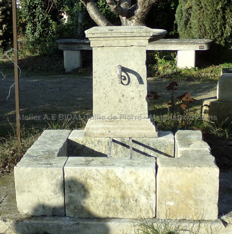 Small fountain in reclaimed materials : a charming garden fountain in old stones by Alain BIDAL (Provence)