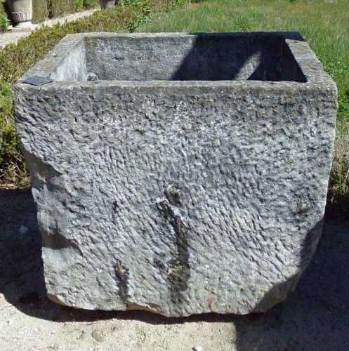 Large antique monolithic stone trough : a rustic planter of generous dimensions