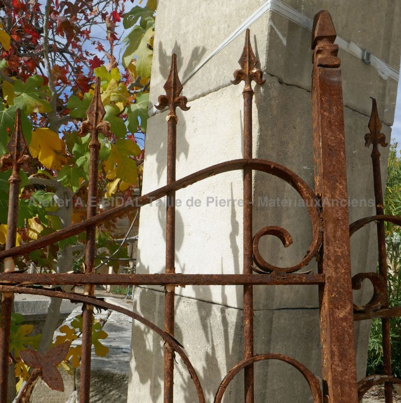 Detail of the forged flat iron decorations on our antique wrought iron gate.