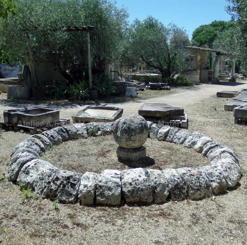 Antique round basin in rustic natural stones by  - Alain Bidal Antique Materials in Provence