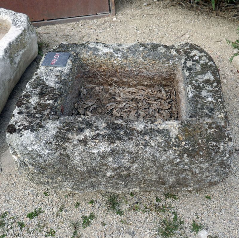 Small granite trough worn and patinated by time for sale at Alain BIDAL Antique Materials in Provenc