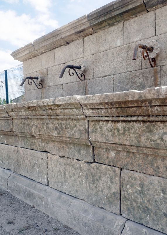 Weathered reclaimed stone garden fountain - Large wall fountain for sale at Atelier Alain BIDAL (Provence)