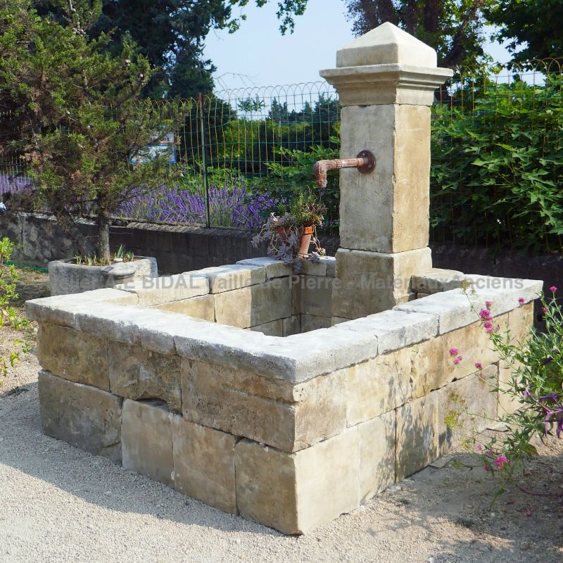 Rustic fountain in old stones by Alain BIDAL, Antique Materials' expert in Provence