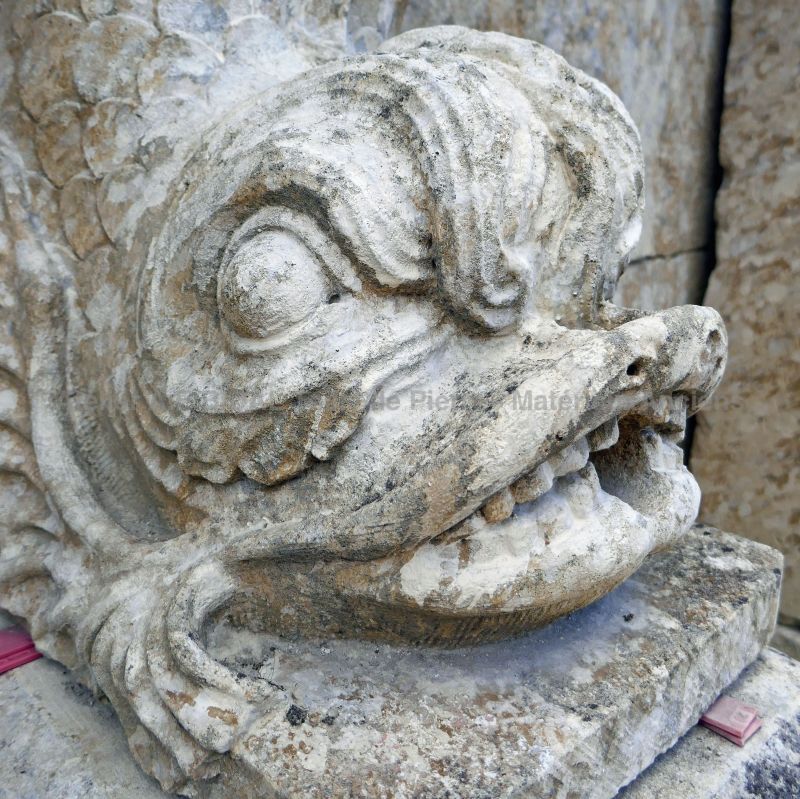 Fish hand-sculpted in natural stone by Atelier Alain Bidal in Provence