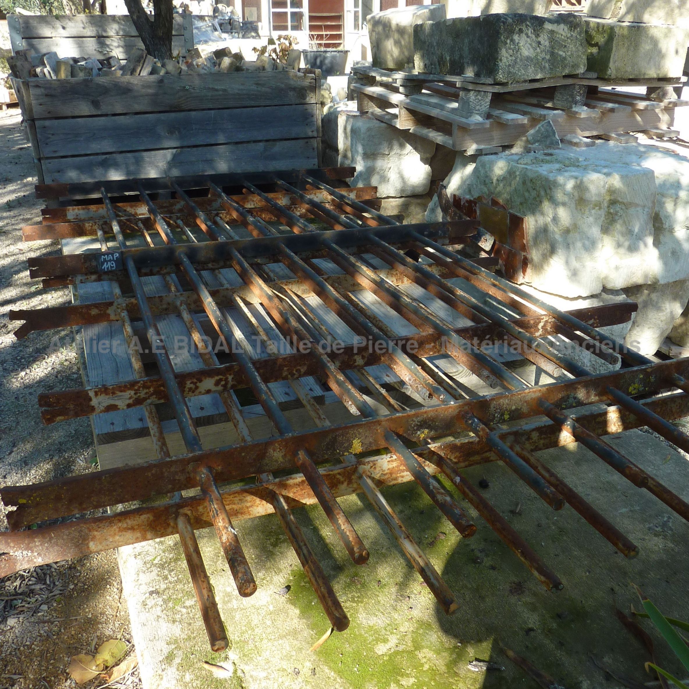 Antique wrought iron fencing gate with round bars