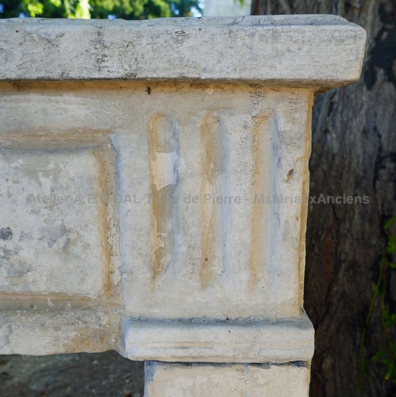 Details of the hand-carved moldings on this old Louis 16 stone fireplace.