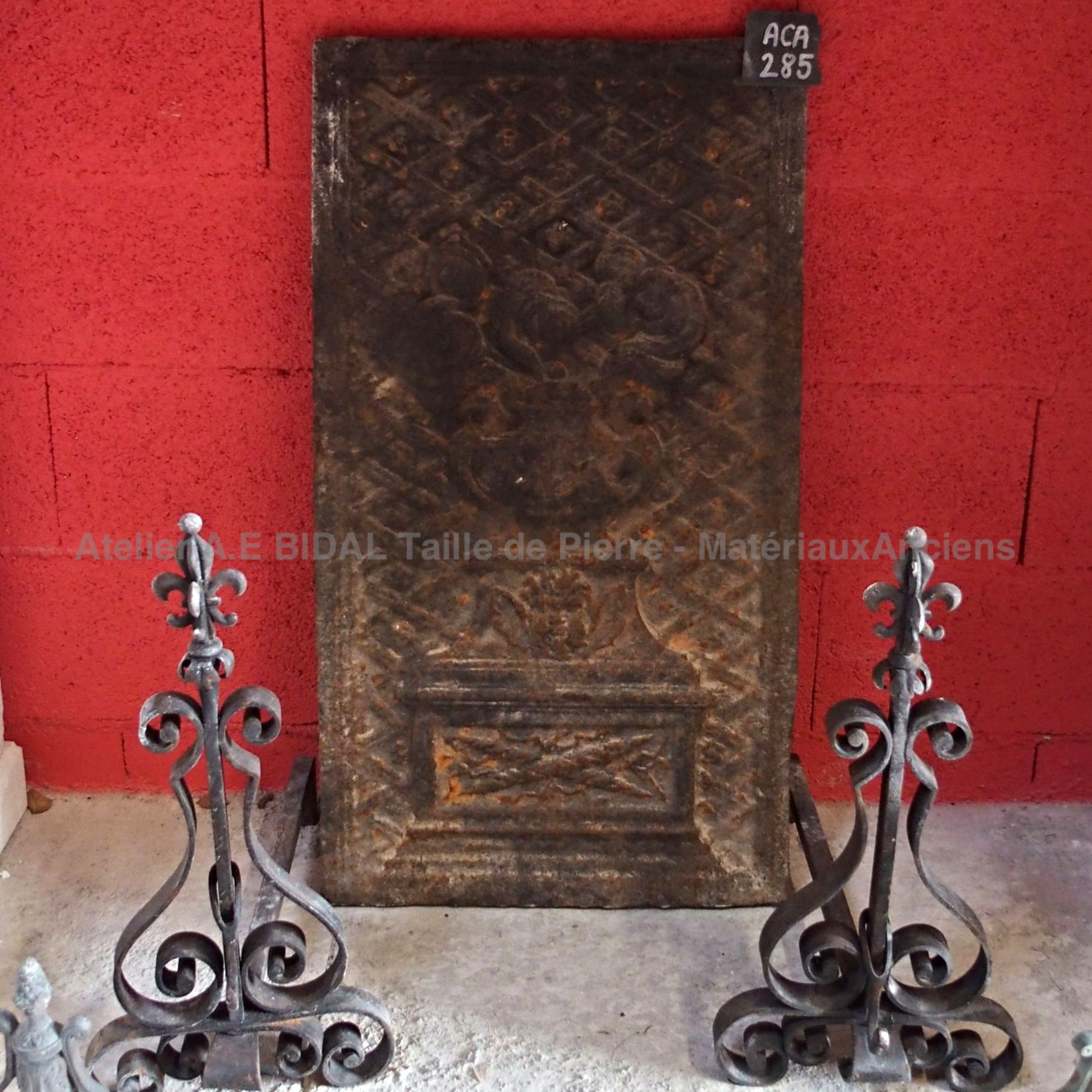 Cast iron fireback- one of the fireplace  accessories of our catalogue of  Provence style crafmade decorative items  made of old materials.