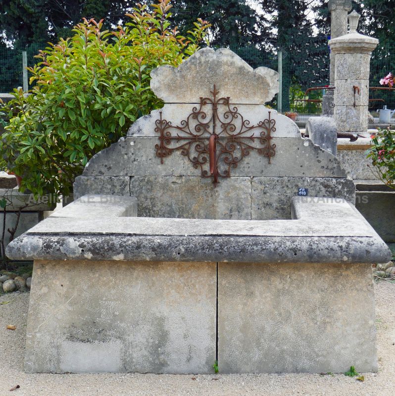 Fountain in old stone and metal by Alain Bidal Antique Materials in Provence