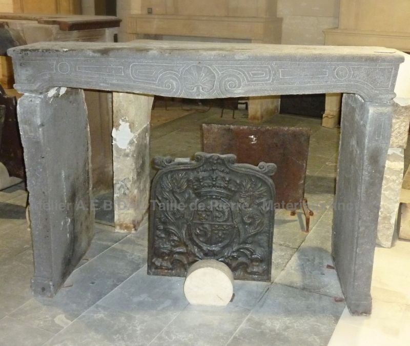 Superb antique French fireplace - a black stone fireplace.