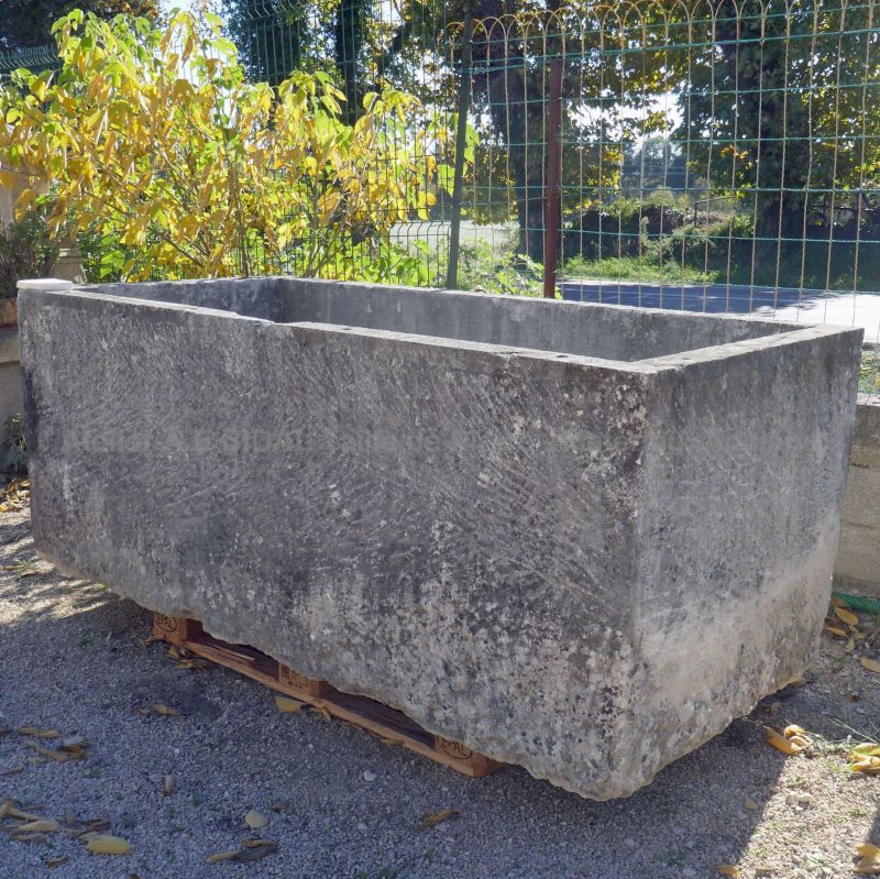 Antique trough in stone from Alain Bidal Antique Materials in Provence.